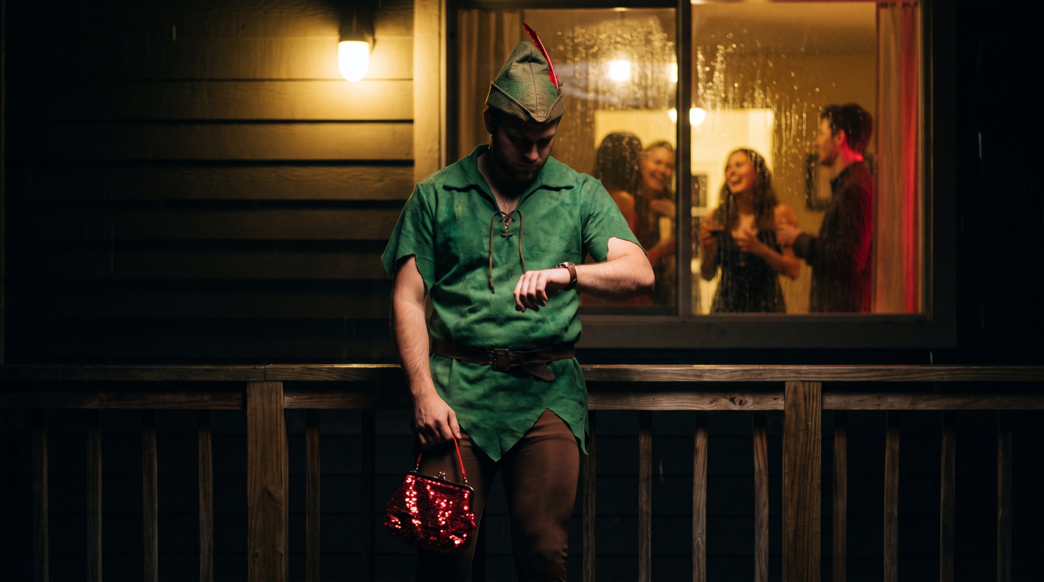 A man in a sad Peter Pan costume, green felt hat and tights, under a porch light, holding a tiny purse and checking his watch at 10:58.